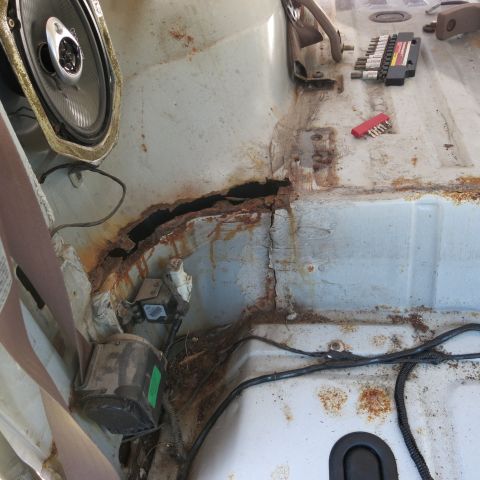 1995 Ford Bronco - Severe rust has compromised the structural integrity of this vehicle's interior floor pan.