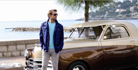 1991 Ford LTD Crown Victoria - A man poses next to a classic two-tone coupe by the water.