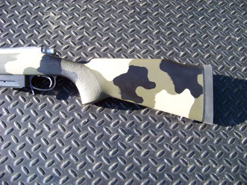 1995 Mercury Grand Marquis - A camouflage rifle stock is shown against a textured metal background, with a SuperMotors watermark at the bottom.