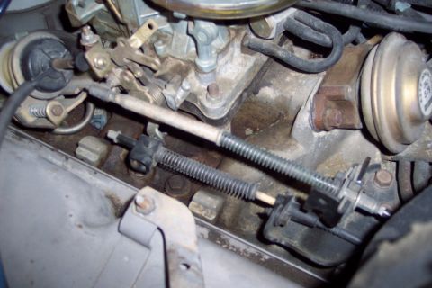 1991 Ford LTD Crown Victoria - Engine carburetor and throttle linkage detail, likely from a V8 engine.