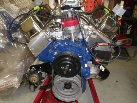 1970 Ford Mustang - Close-up of a V8 engine, likely a Ford 351 Windsor, on an engine stand.