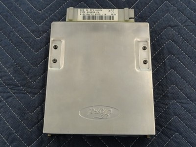 1994 Ford Bronco - This is a Ford electronic control unit (ECU) with a "Ford" logo and "X32" marking.