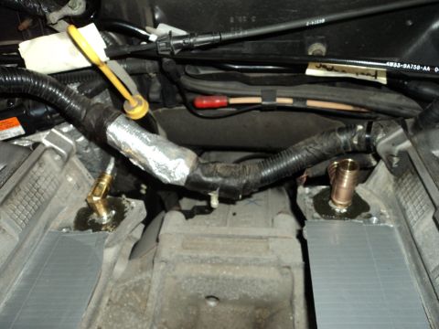 2004 Mercury Grand Marquis - Close-up view of engine bay modifications, showing new plumbing and wiring.