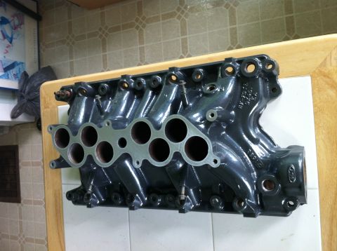 1992 Ford Bronco - A Ford intake manifold, likely for a V8 engine, is shown from a top-down perspective.