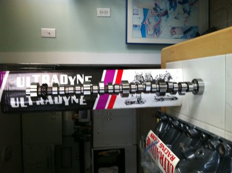 1992 Ford Bronco - A camshaft is displayed on packaging vintage car drawings and brand text.