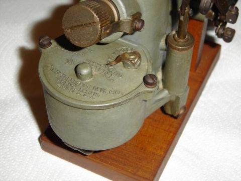 1996 Ford Bronco - This is a close-up view of a Holley carburetor, showing its manufacturer and location.