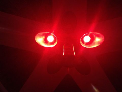 2005 Jeep Wrangler - Close-up of a red third brake light assembly with illuminated bulbs.