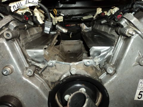 2004 Mercury Grand Marquis - Close-up view of an engine's intake manifold, showing modifications and wiring.