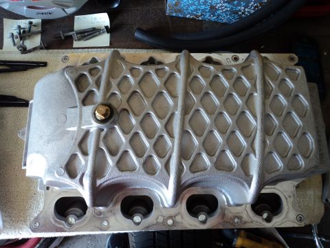 2004 Mercury Grand Marquis - Close-up of a supercharger intake manifold, likely for a performance engine modification.