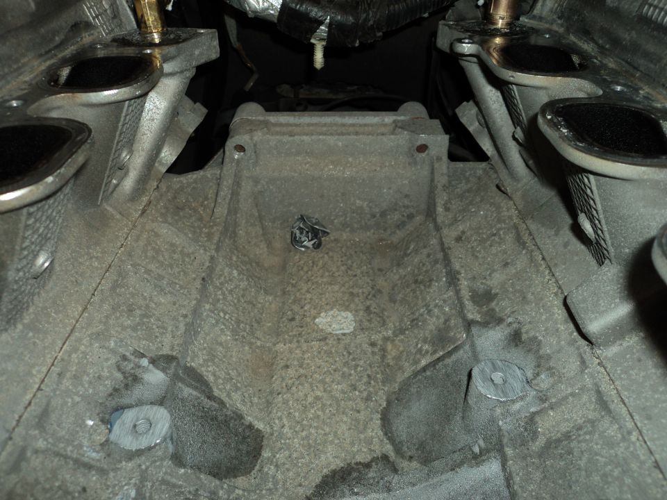 Engine block with exhaust manifolds attached, viewed from above