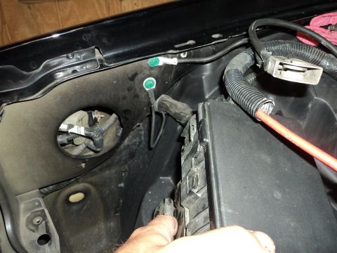 2004 Mercury Grand Marquis - Engine bay wiring and fuse box detail, showing electrical components and connections.