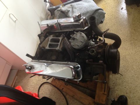1986 Ford Bronco - A V8 engine is shown, possibly for a classic vehicle, with chrome valve covers and a distributor.