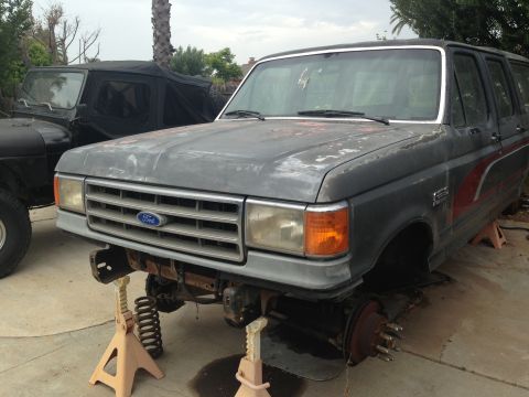 1986 Ford Bronco - This Ford Bronco appears to be from the late 1980s, not 1986, as it is missing its front wheels and bumper.