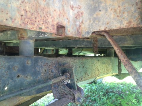 Rusted vehicle frame and undercarriage detail