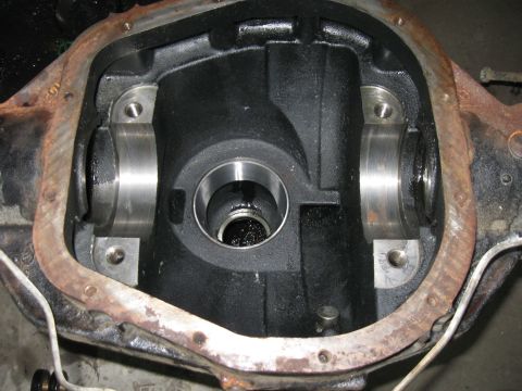 1990 Ford Bronco - This is a view inside a differential housing, showing the bearing seats and the center hole for the pinion gear.