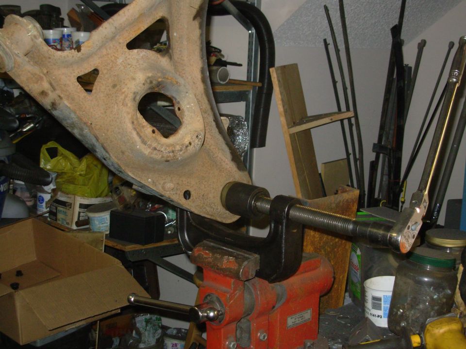 The JY ball joints weren't in perfect condition, so rather than redo all this work in a few months, I stripped everything down and tossed all the wearing parts.