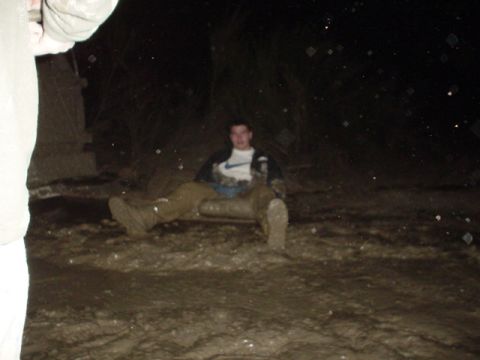 1995 Ford Bronco - Someone is stuck in the mud at night.