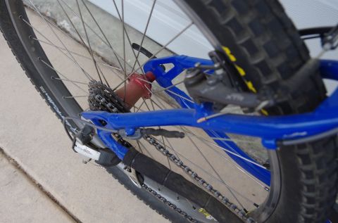 1983 Ferrari Enzo - Close-up view of a bicycle's rear drivetrain and wheel assembly.