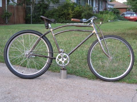 1994 Ford Bronco - This custom cruiser bicycle features a unique frame design and large wheels, with a weathered finish.