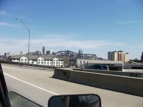 1990 Ford Bronco - View of a city skyline and bridge from a highway.