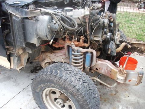 1990 Ford Bronco - Front end of a 1990 Ford Bronco disassembled for engine work.