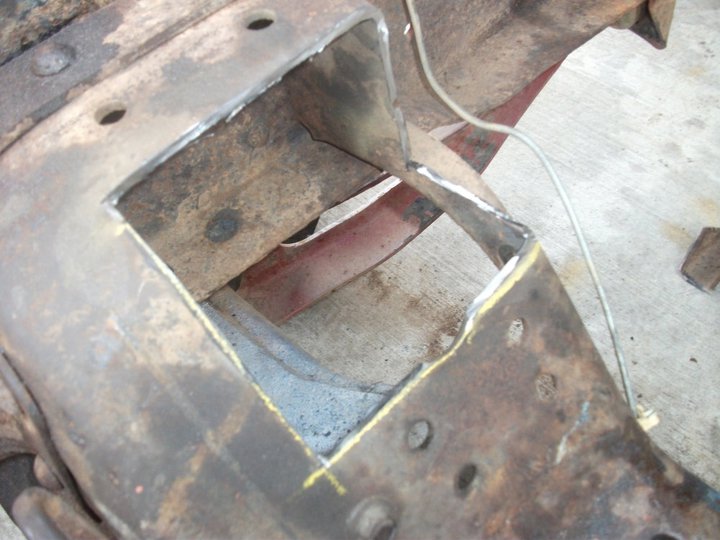 Cut frame section with yellow markings and a wire
