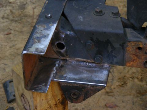 1978 Ford Bronco - Close-up of a welded metal frame section, likely part of a vehicle chassis.