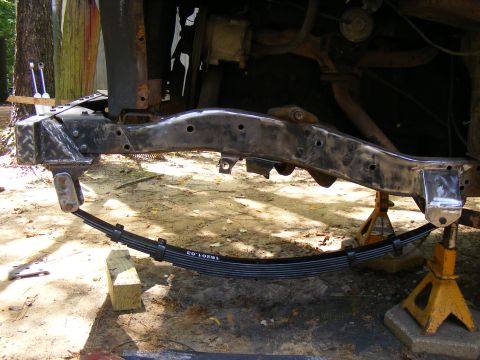 1978 Ford Bronco - Leaf spring and frame assembly of a vehicle undergoing repair or restoration.