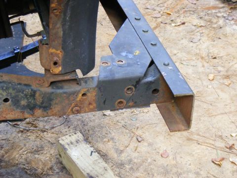 1978 Ford Bronco - This image shows a heavily rusted vehicle frame, possibly undergoing restoration or repair.
