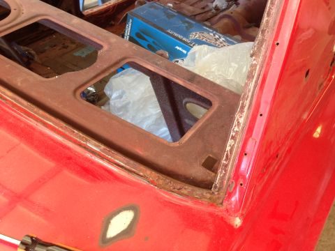 1964 Ford Fairlane - Car body panel shows rust damage and areas prepped for paint.