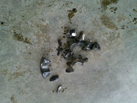 1992 Ford Bronco - Engine bearings have failed and are scattered on the floor.