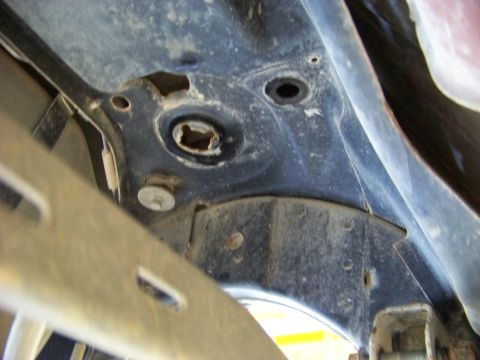 1999 Mercury Grand Marquis - Close-up of vehicle undercarriage components, with a Supermotors.net watermark visible.