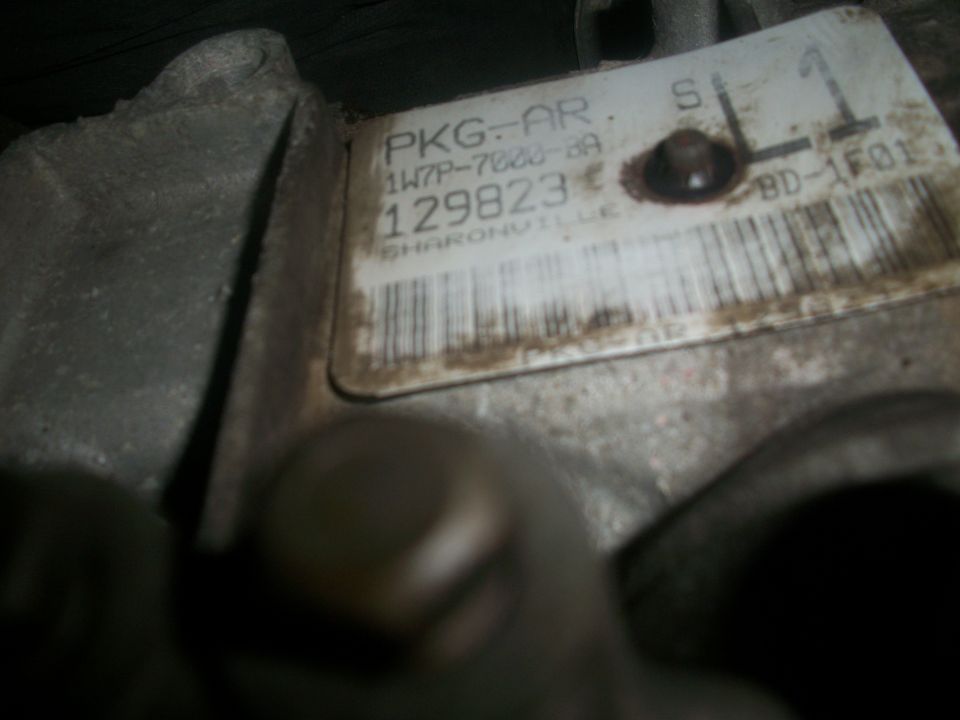 Part label with text PKG-AR, 129823, and SHARONVILLE