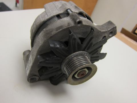2001 Ford Crown Victoria - This is a car alternator, a component that generates electrical energy.