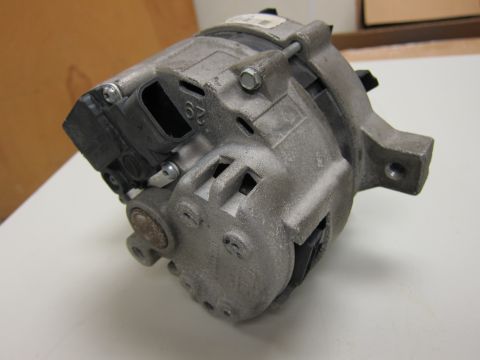 2001 Ford Crown Victoria - This is a close-up view of a vehicle alternator, not wheels, and does not match the registry claim.