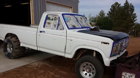 1995 Ford Bronco - This pickup truck appears to be from the 1980s, not a 1995 Bronco.
