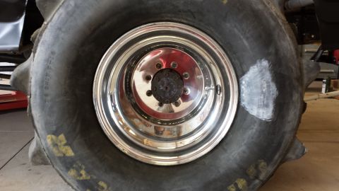 1995 Ford Bronco - This photo shows a large tire and chrome wheel, not a 1995 Ford Bronco.