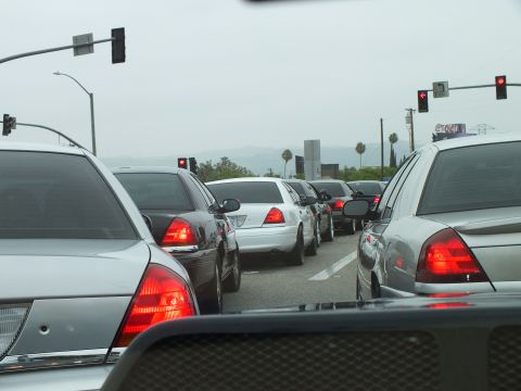 2003 Ford Crown Victoria - Photo of vehicles stopped in heavy freeway traffic at a signal, not a technical document.
