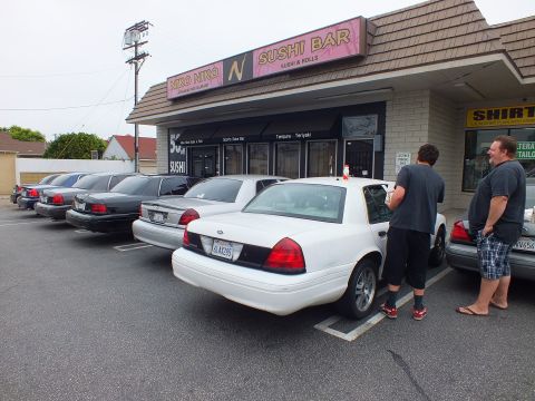 2003 Ford Crown Victoria - Photo of Ford Crown Victoria sedans and people gathered at a strip mall sushi restaurant car meet.