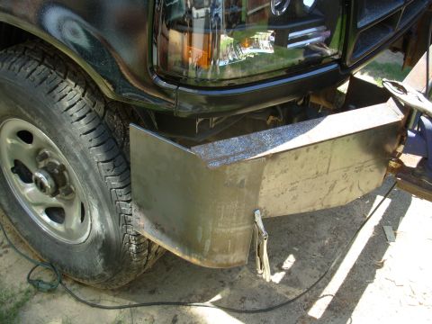 1983 Ford Bronco - After laying out the angle of the front panels onto the curve, I cut the bumper corners out.