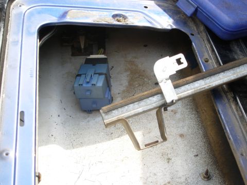 1983 Ford Bronco - These modules have been flopping around, interfering with the glass, and catching rain. This bracket was made for them, so now they'll stay…