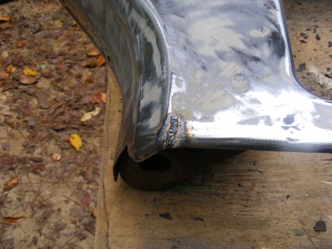 1978 Ford Bronco - This image shows a close-up of a metal component that has been welded, likely during a repair or fabrication process.