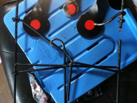 2006 Ford E350 - Close-up of a blue Little Tikes toy target with black metal frame.