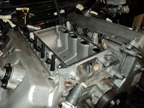 2004 Mercury Grand Marquis - Close-up view of an engine's intake manifold and fuel injectors, likely during a repair or modification.