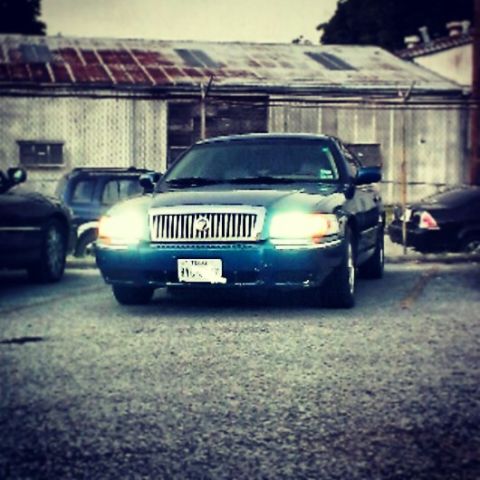 2006 Mercury Grand Marquis - Front view of a blue 2006 Mercury Grand Marquis with a Texas license plate.