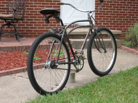 1994 Ford Bronco - A vintage bicycle with wide tires and a classic frame is shown outdoors.
