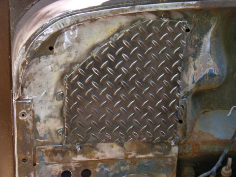 1978 Ford Bronco - Custom diamond plate patch installed on a vehicle's body panel.