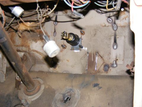 1978 Ford Bronco - Interior view of a vehicle's dashboard area with exposed wiring and ignition switch.