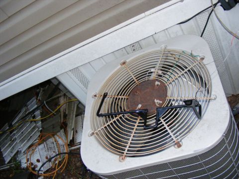 1978 Ford Bronco - An outdoor air conditioning unit with a prominent fan and the Supermotors.net logo visible at the bottom.