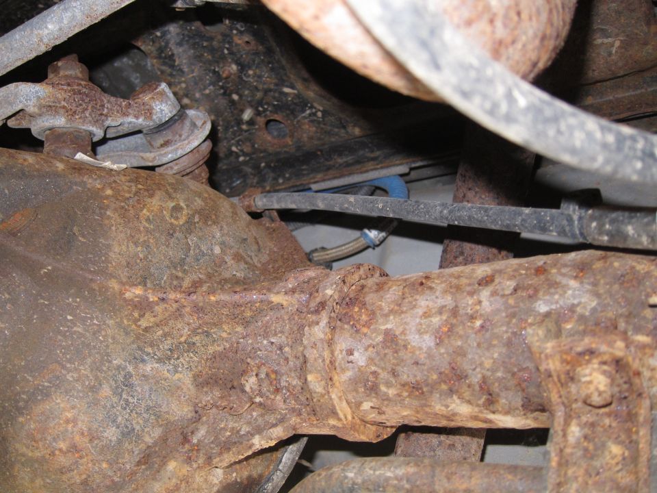 Rusted rear axle and suspension components